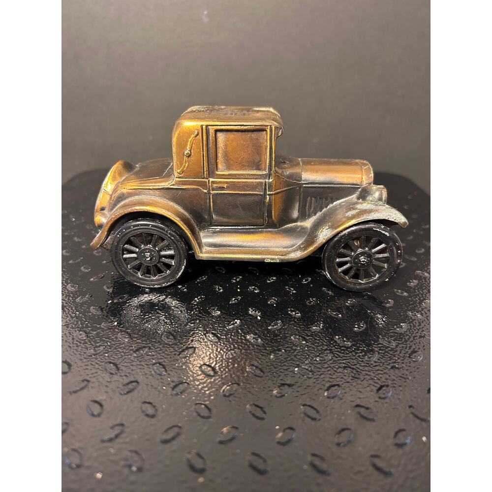 vintage Banthrico Inc. coin bank modeled after a 1926 Pontiac Coupe.